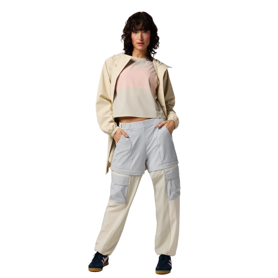 Lightweight stretch pants worn on trail in warm weather