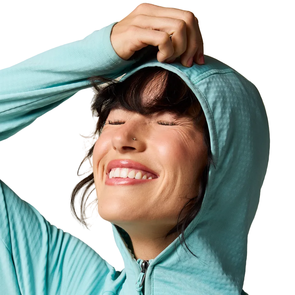 Cotopaxi Otero full zip worn with hood for added warmth 