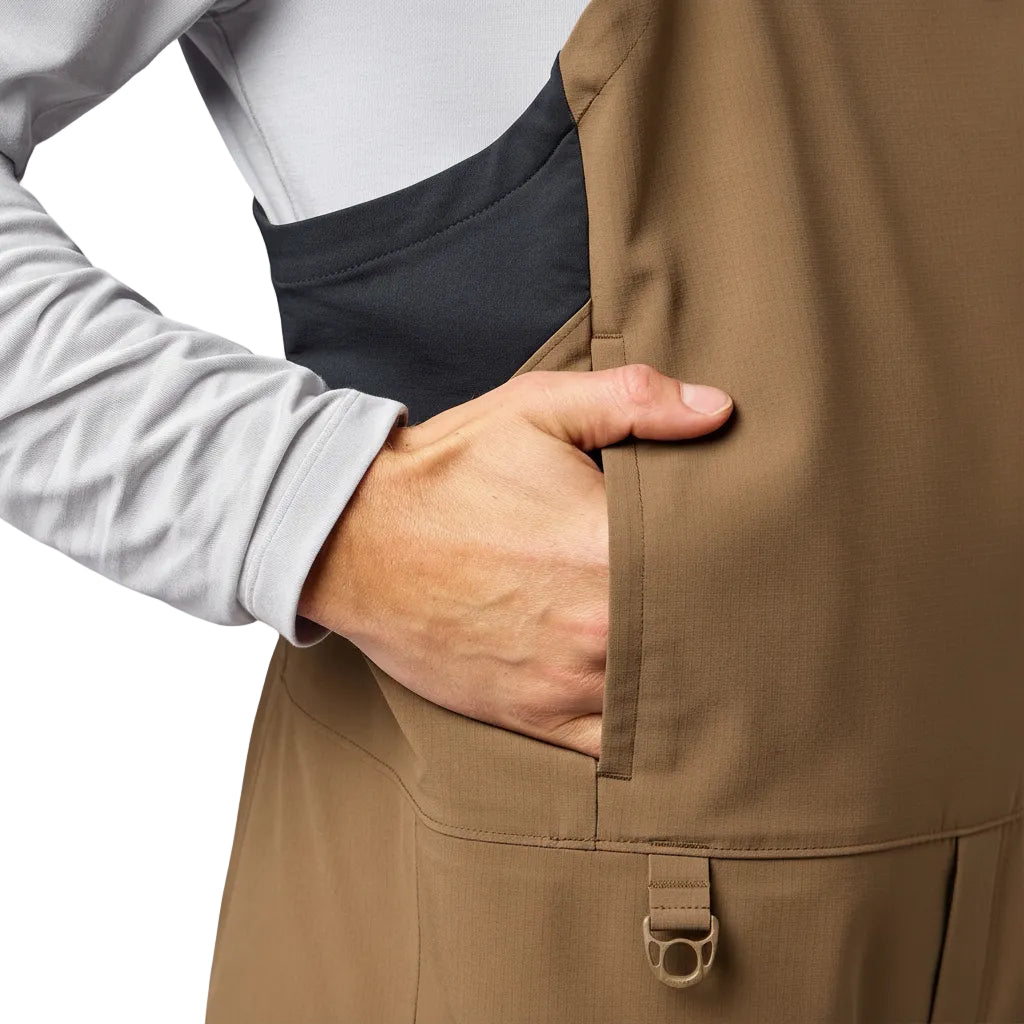 Fleece-lined hand warmer pocket detail on Simms Men’s Challenger Fishing Bib