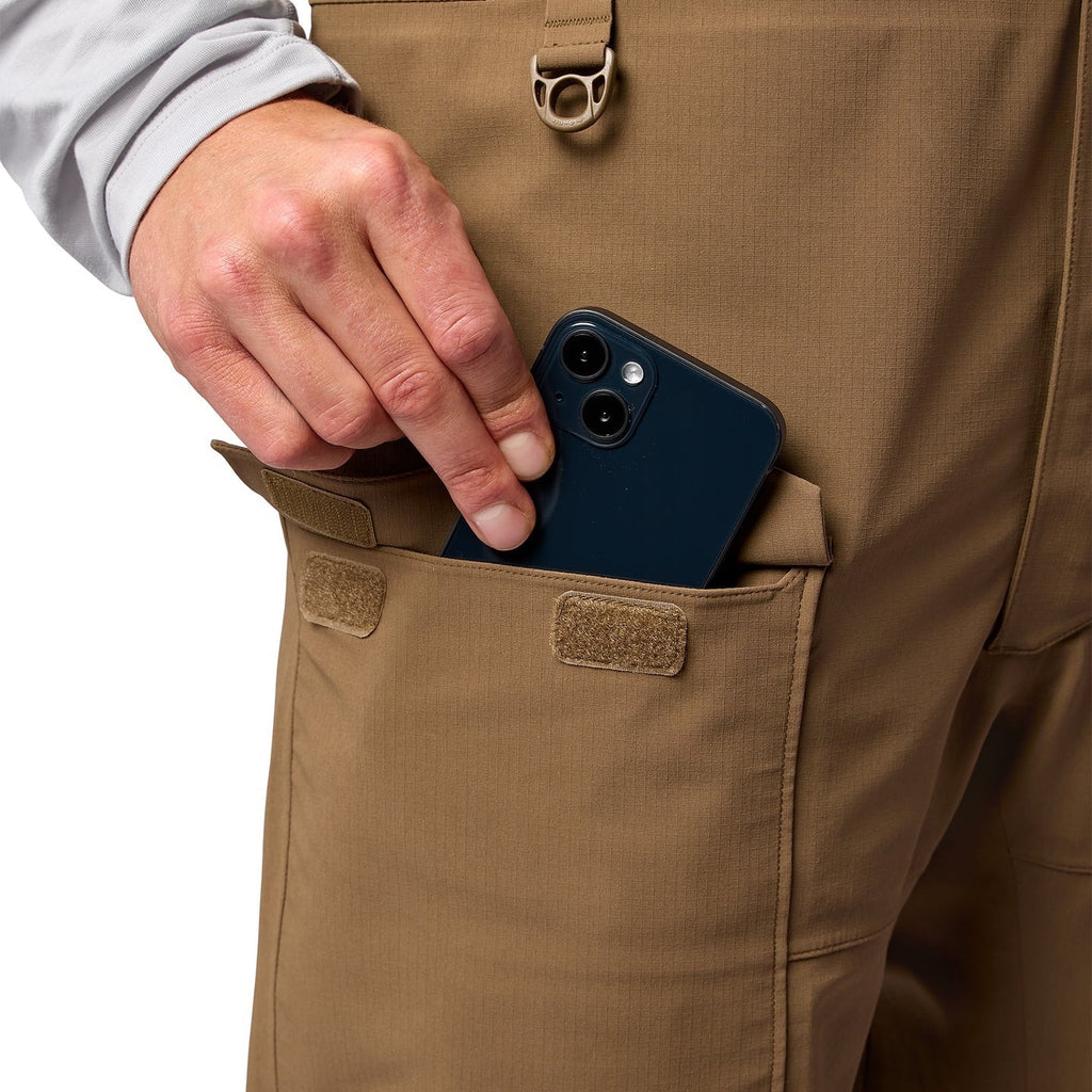 Side pocket detail on Simms Men’s Challenger Fishing Bib in Jasper