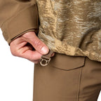 Waist detail view of Simms Men’s Challenger Fishing Jacket in Windy Jasper