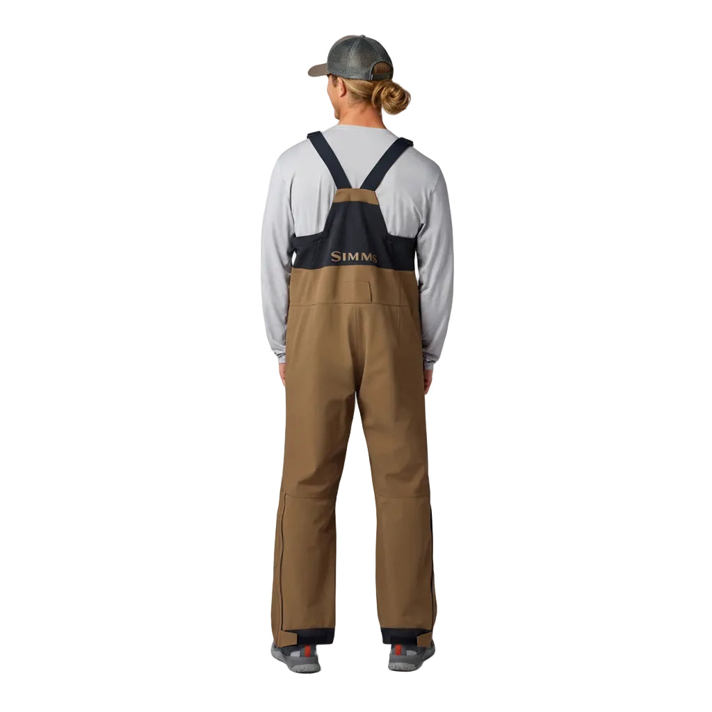 Back view of Simms Men’s Challenger Fishing Bib in Jasper with stretch back panels