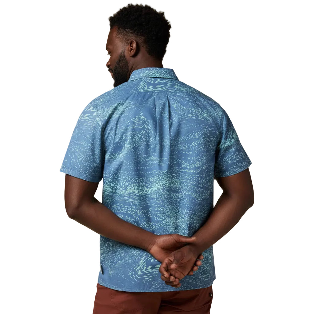 Back view of the Cotopaxi Estival Button Up Shirt in Waves Steel Blue showing the all-over pattern and regular fit