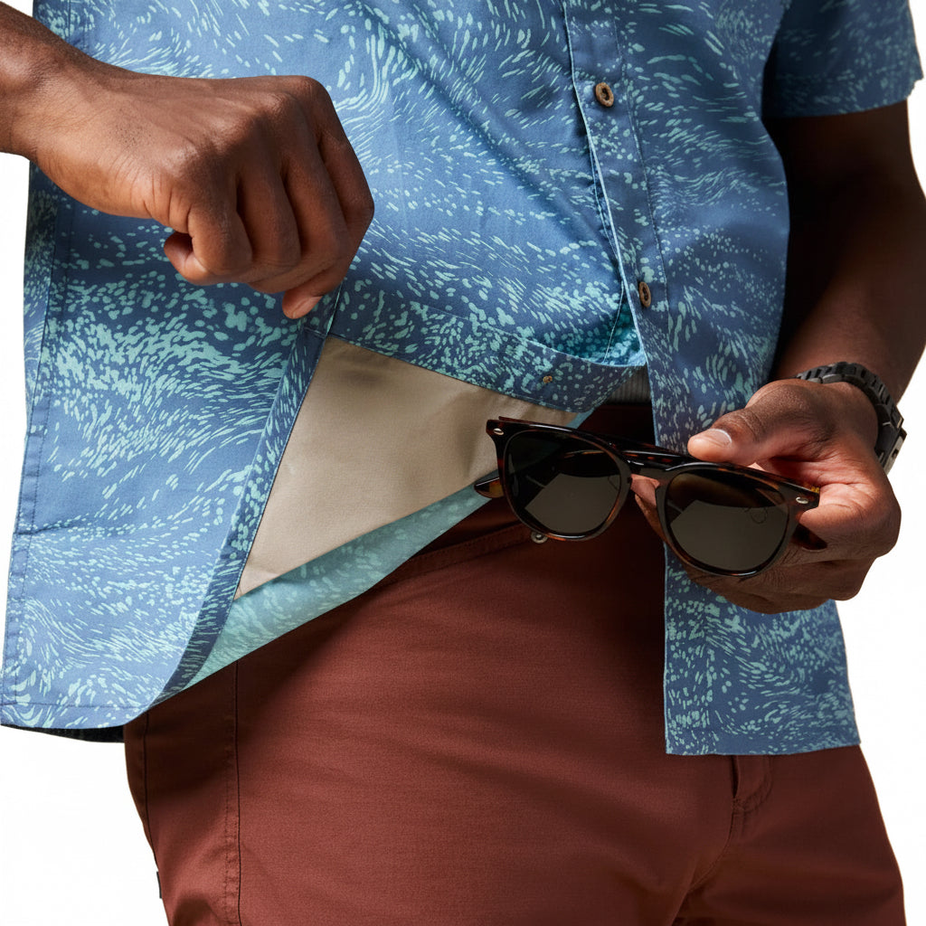Built-in microfiber sunglass-cleaning cloth detail on the hem of the Cotopaxi Estival Button Up Shirt
