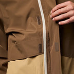 Cotopaxi men’s Rayu Rain Jacket in Dune and Khaki zipper detail view