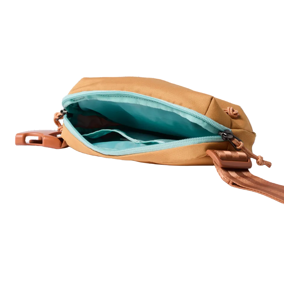 Todo hip pack open showing main compartment and slip pocket