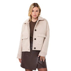 EsQualo Short Coat in Biscuit front view with lapel collar, long sleeves and chest pockets on model