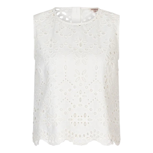 Close-up of the Esqualo Top Broderie Anglaise in White highlighting the intricate embroidered eyelet detailing