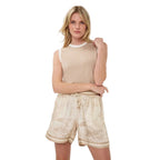 Model wearing Esqualo Contrast Trim Rib Knit Sleeveless top in Natural