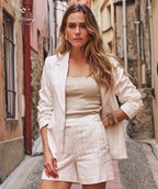 Model wearing EsQualo Linen Striped Blazer in Off White Sand