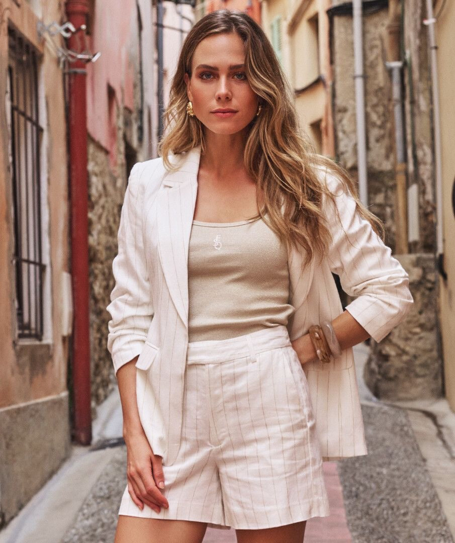 Model wearing EsQualo Linen Striped Blazer in Off White Sand