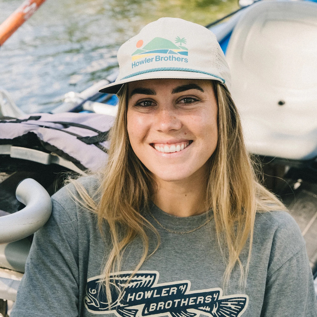 Howler Brothers Aperture Tech Strapback Hat in Bahía de Howler / Stone worn while rafting