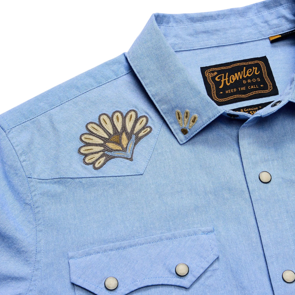 Detail of Howler Brothers Men's Crosscut Deluxe Longsleeve in Fanned Flora Faded Blue Oxford