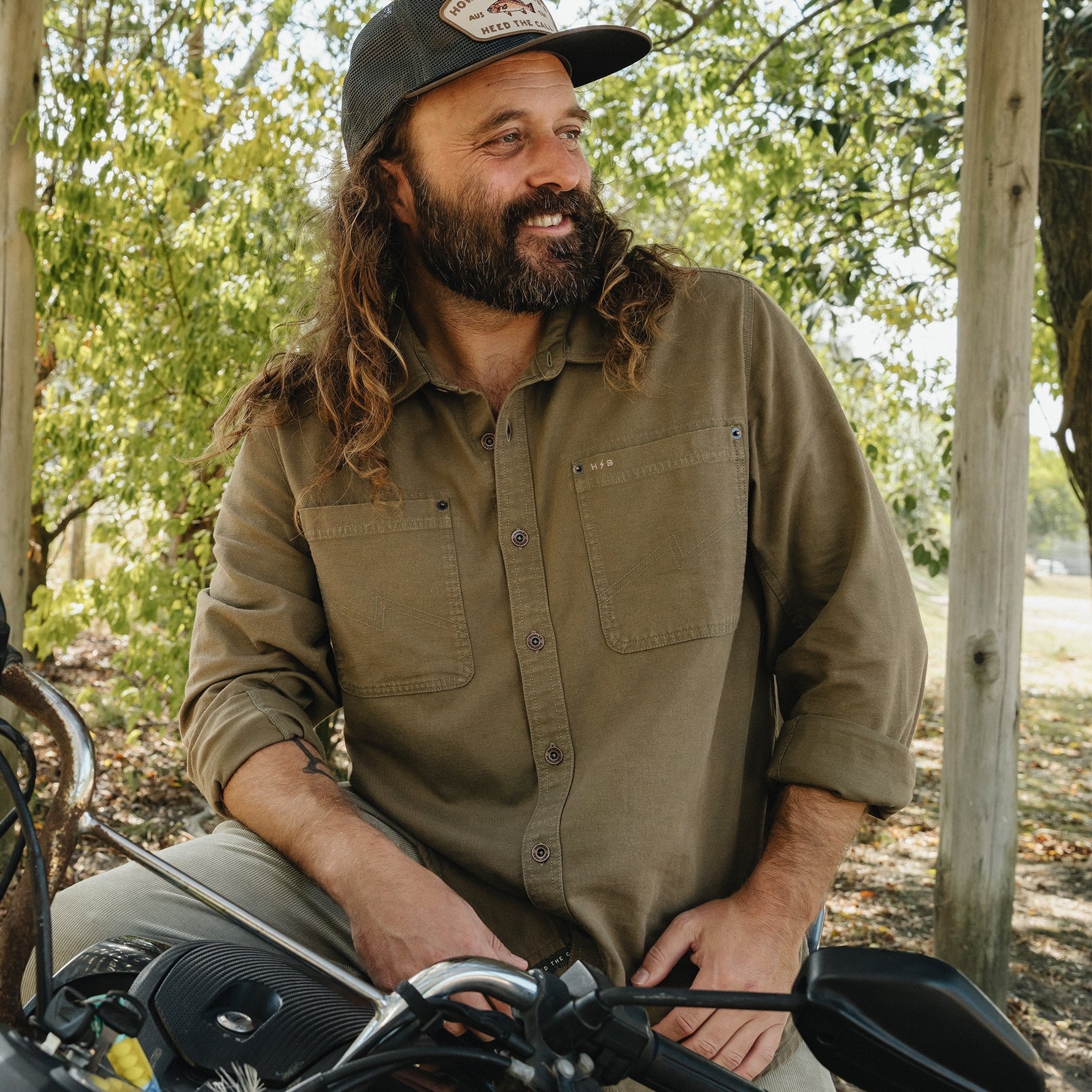 Men's Howler Brothers HB Trade Shirt in Faded Olive lifestyle view