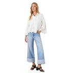 Full-body view of Karen Kane off-white embroidered button-front blouse