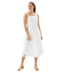 Front view of the Karen Kane Embroidered Cut-Out Sundress in Off White, showcasing the square neckline, wide straps, floral eyelet embroidery, and flattering midi silhouette.