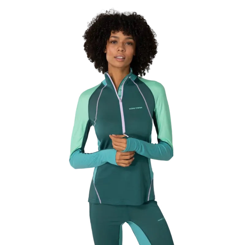 Kari Traa Women’s Alma Half Zip in Peacock front view with high collar, half zip and contrast body-mapped panels