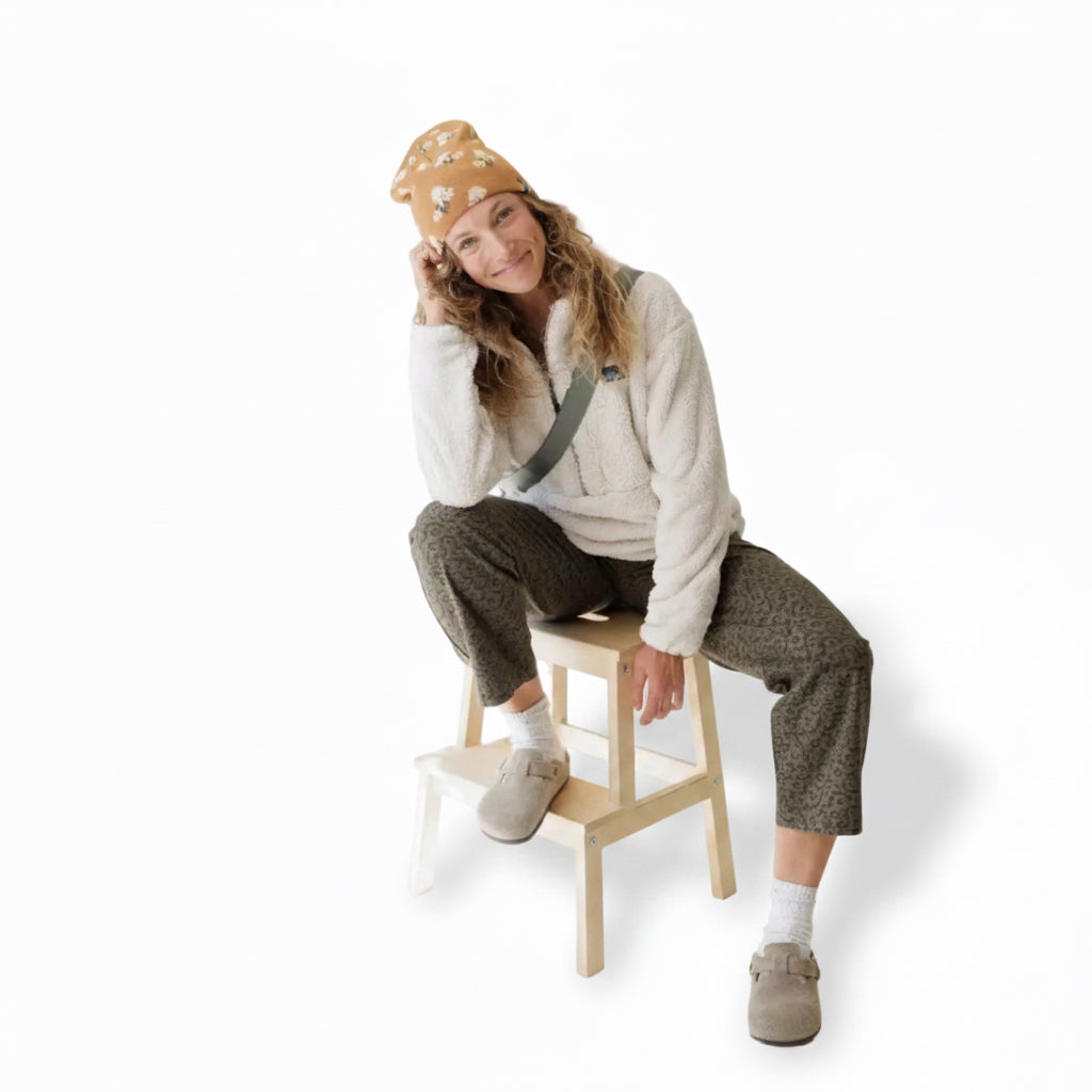 KAVU Benny Beanie in Forage Patch with allover jacquard knit design on model