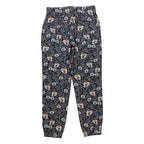 Women's KAVU Bucerias Pant in Quiet Wildflowers back view showing a comfortable silhouette and all-over floral pattern
