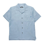 Men's KAVU Deckhouse Short Sleeve Shirt in Tropical Fog front view featuring organic cotton jacquard weave fabric and classic camp-shirt styling