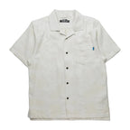 Men's KAVU Deckhouse Short Sleeve Shirt in Tropical Sands front view featuring organic cotton jacquard weave fabric and classic camp-shirt styling