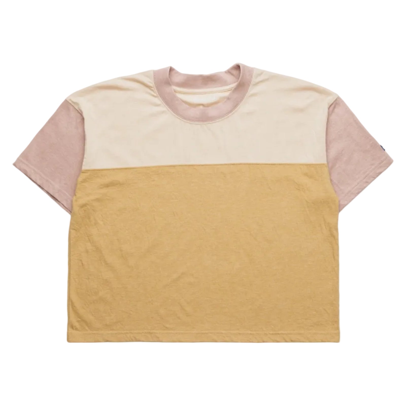 Close-up detail of the KAVU Eevi S/S Tee showing the soft jersey knit fabric and color-block seam construction.