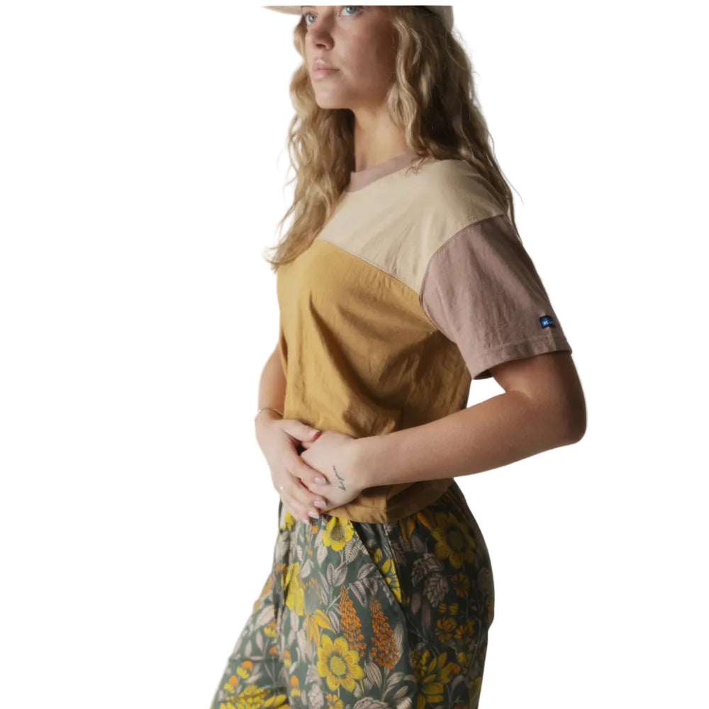 Side view of the KAVU Eevi S/S Tee in Desert Wind highlighting the cropped length and comfortable fit.