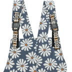 Alt Text: Close-up of the KAVU Montanita Overall in Daisy Love highlighting the floral print and lightweight woven construction