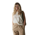 Woman wearing the KAVU Summertown T-Shirt in Soapnut, styled for casual outings, travel, and outdoor adventures