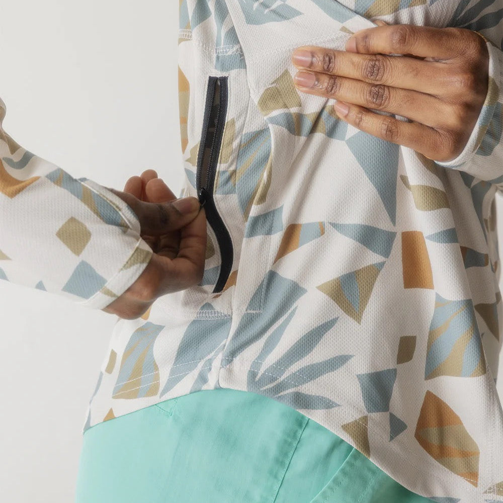 Close-up of the KAVU Sunshade Hoody in Mod Mix highlighting the honeycomb mesh knit fabric and colorful digital print