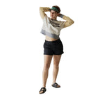 Women's KAVU Tepic Short in Black front view featuring lightweight stretch woven fabric and active outdoor styling with model