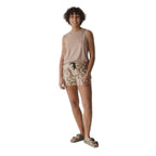 Full-body view of a woman wearing the KAVU Tepic Short in Late Summer Leaf for hiking, travel, and everyday adventures