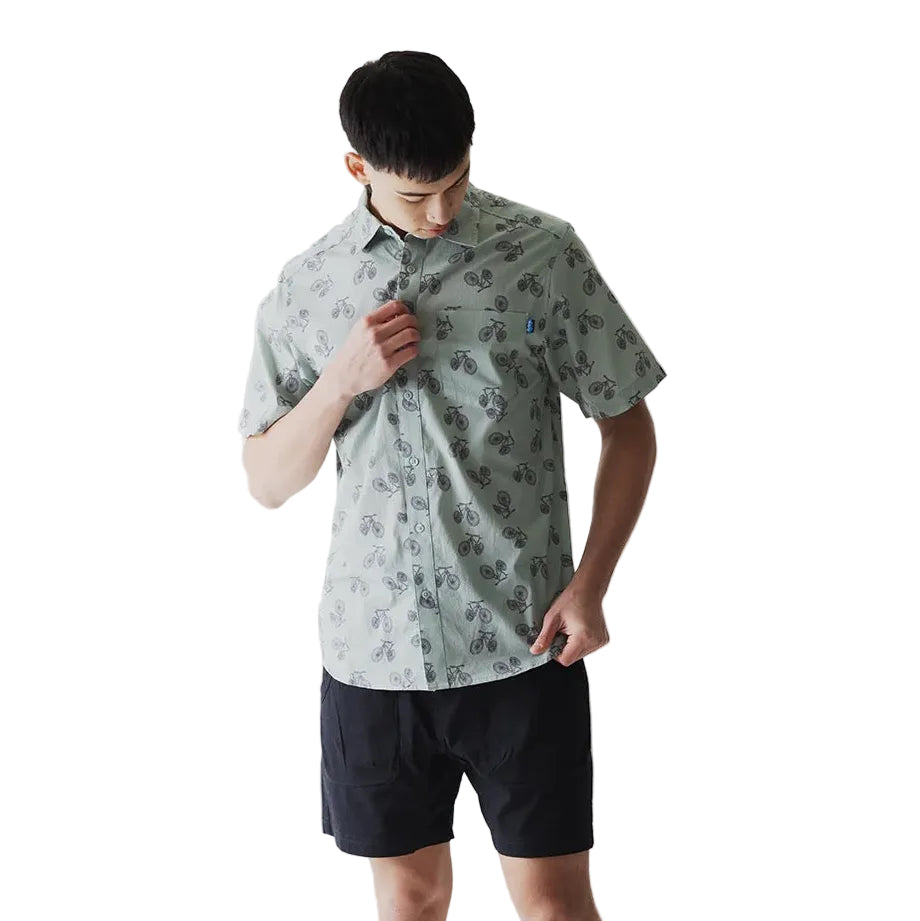 Model wearing the KAVU The Jam S/S Shirt in Bike Lane outdoors