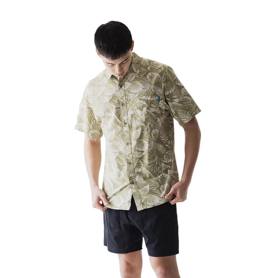 Model wearing the KAVU Topspot S/S Shirt in Calm Palm outdoors