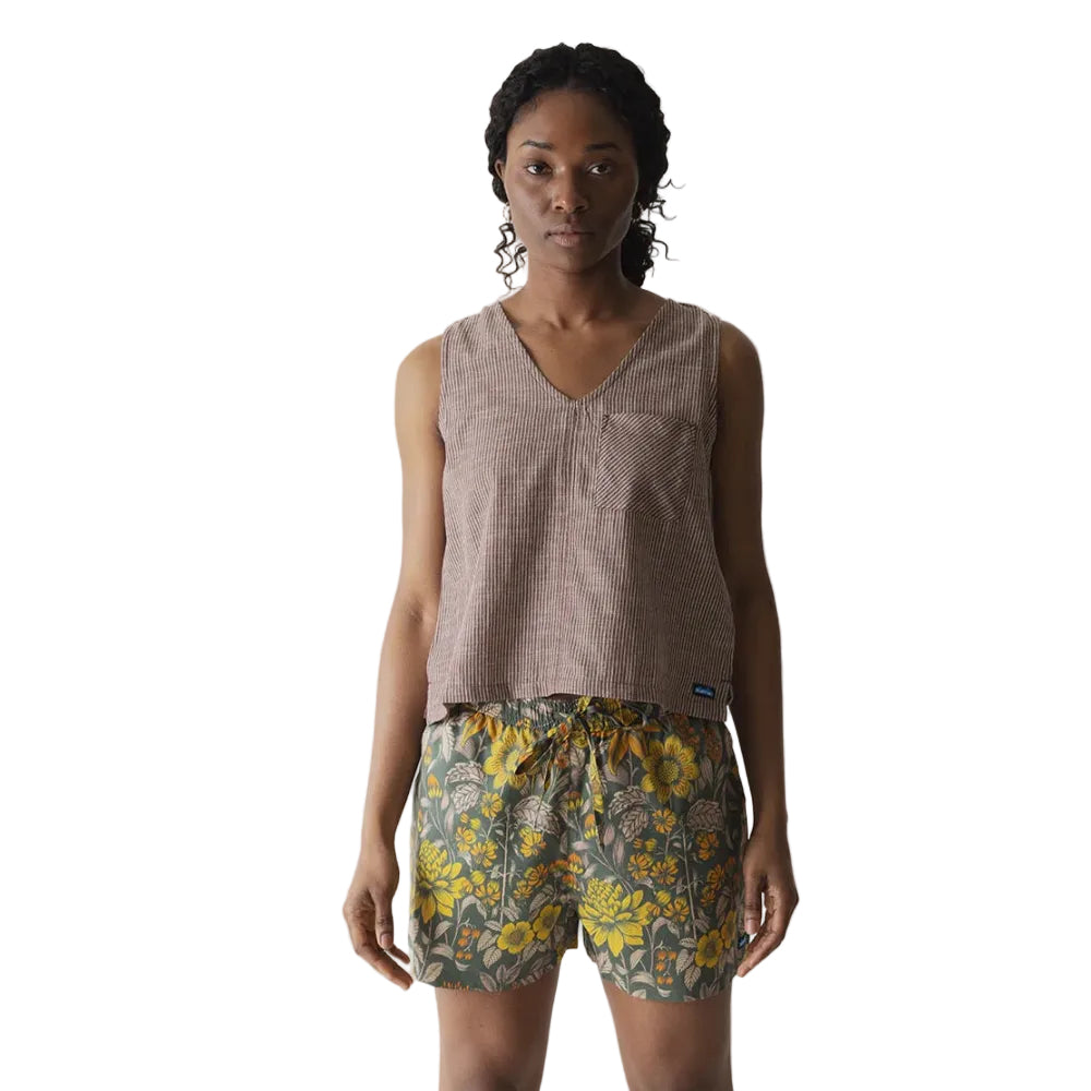 Full-body view of a woman wearing the KAVU Vacay Tank Top in Chocolate for travel, casual outings, and warm-weather adventures