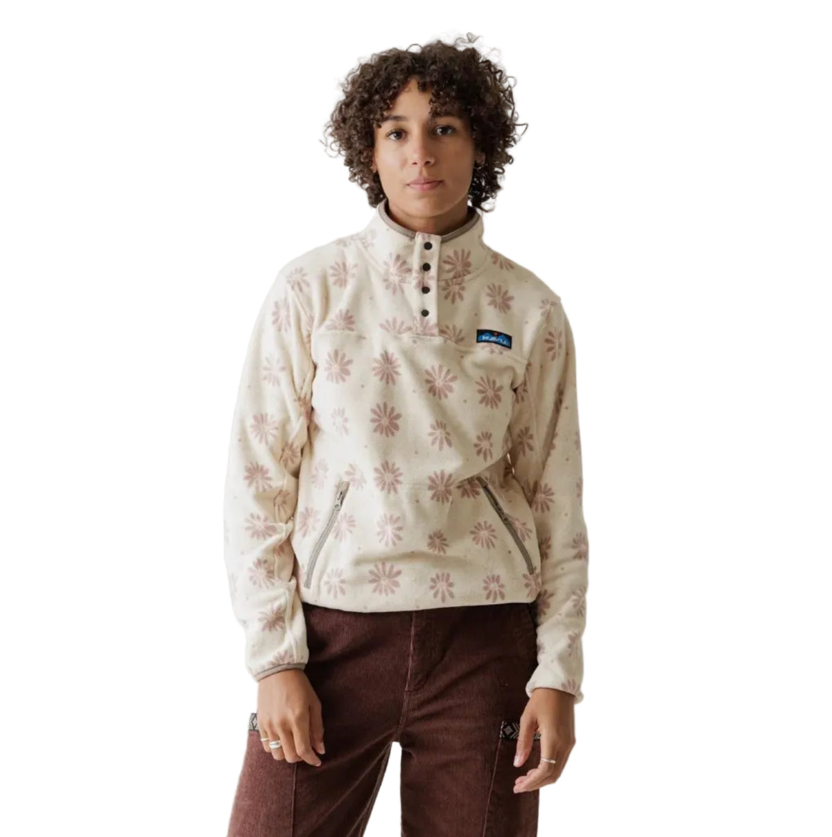 Full-length front view of woman wearing KAVU Women's Cavanaugh Fleece Pullover in Snow Floral