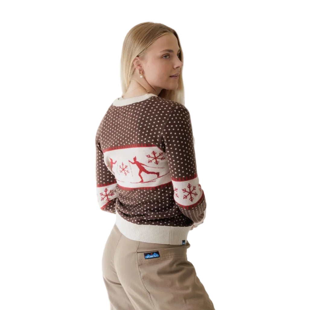 Back view of woman wearing KAVU Women's Hillrose Sweater in Slopeslide showing the winter jacquard pattern