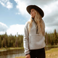 KÜHL Women's Hygge 1/2 Zip in Natural lifestyle view