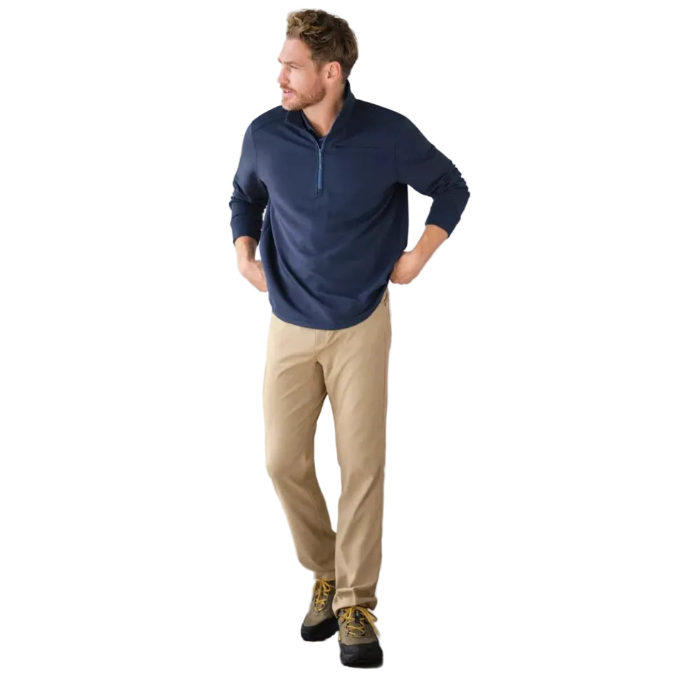 Man wearing LL Bean Venture Stretch 5-Pocket Pant in Dark Driftwood outdoors