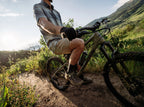 Stretch performance shorts worn on trail in summer