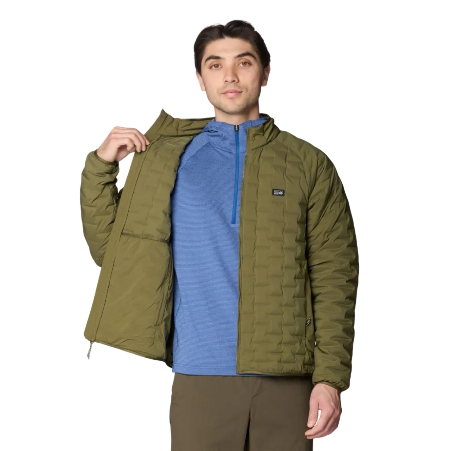 Detail view of the narrow stretch baffles on Mountain Hardwear Men’s StretchDown Light Jacket in Combat Green
