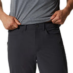 Detail view of the softshell fabric and waist on Mountain Hardwear Men’s Yumalino Lined Pant in Dark Storm