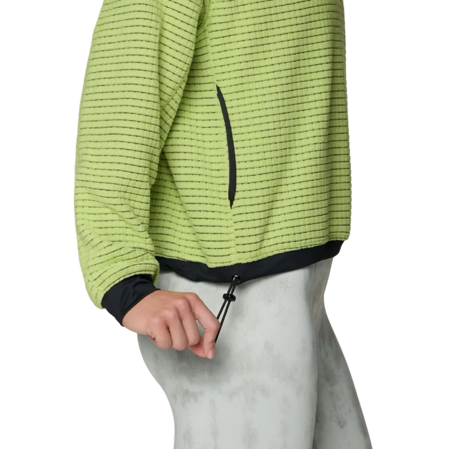 Detail waist view of the grid fleece on Mountain Hardwear Women’s Summit Grid Big Grid Crew in Bright Lichen