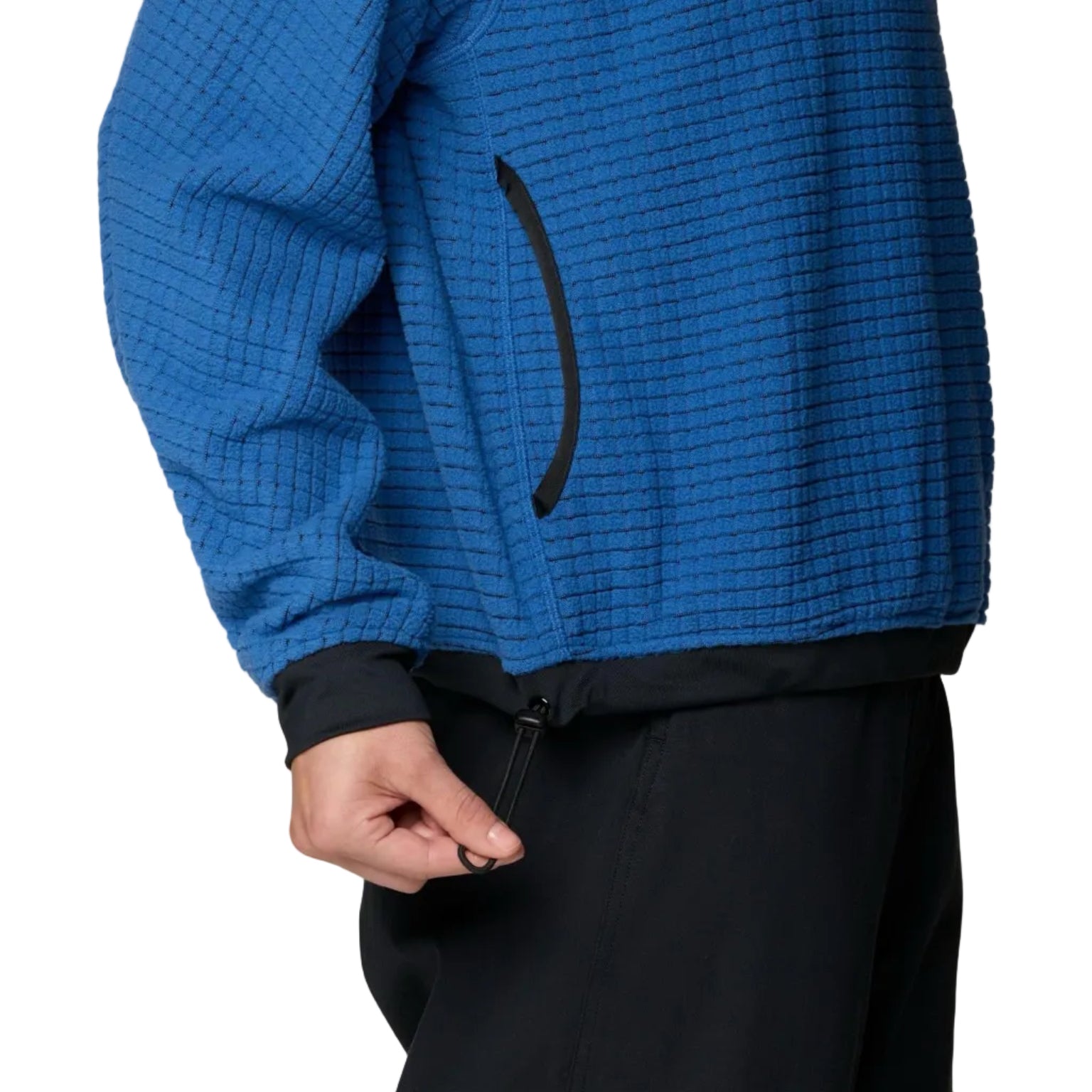Detail waist view of the grid fleece on Mountain Hardwear Women’s Summit Grid Big Grid Half Zip in Berry Blue