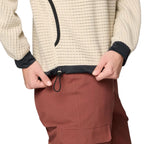 Detail waist view of the grid fleece on Mountain Hardwear Women’s Summit Grid Big Grid Hoody in Fossil