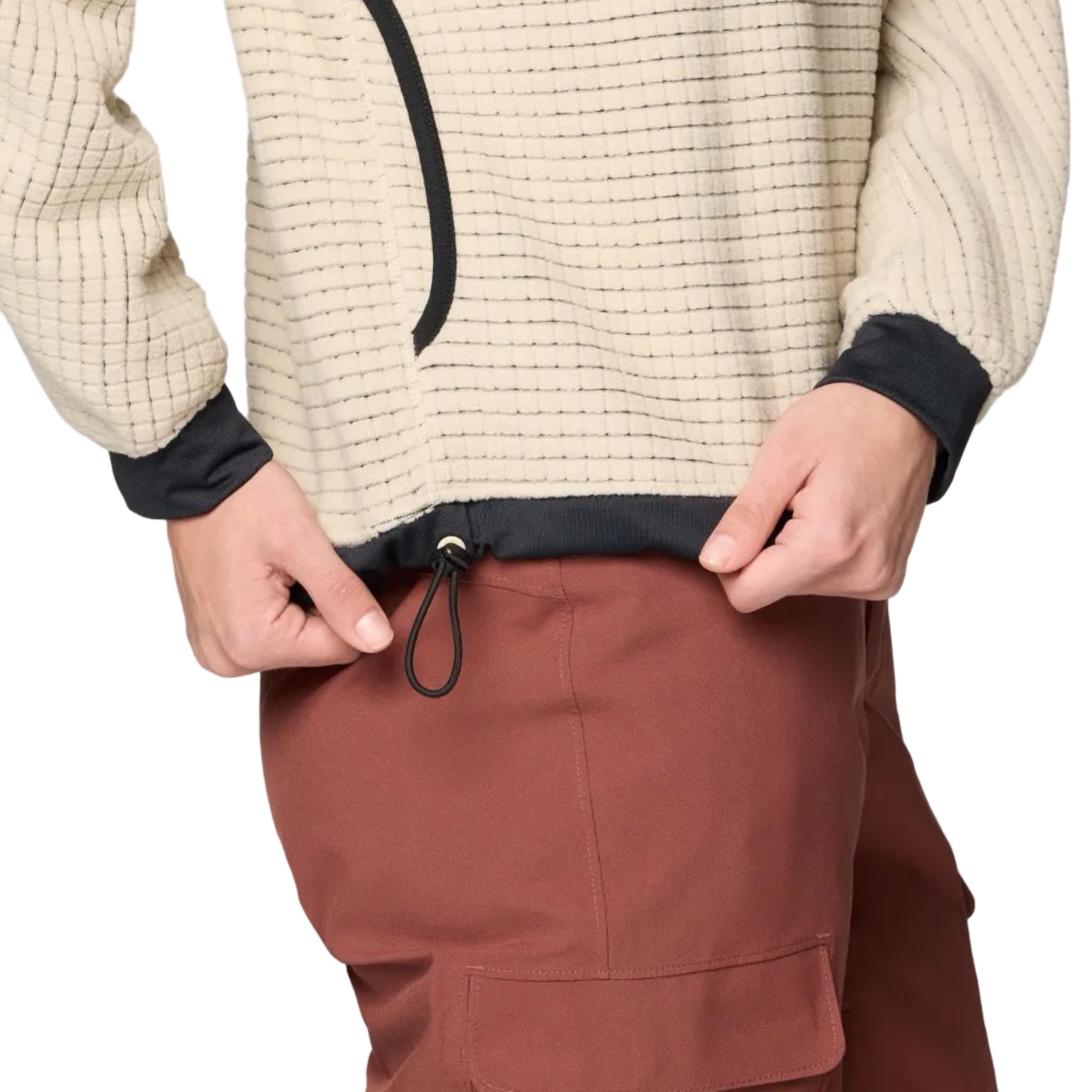 Detail waist view of the grid fleece on Mountain Hardwear Women’s Summit Grid Big Grid Hoody in Fossil