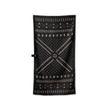 Front view of Nomadix Fitness Towel in Mud Cloth featuring black and cream geometric pattern