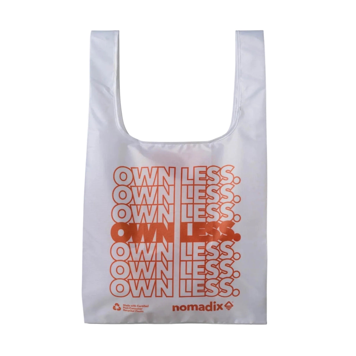 Front view of Nomadix Pocket Tote in Own Less Do More featuring outdoor-inspired graphic design