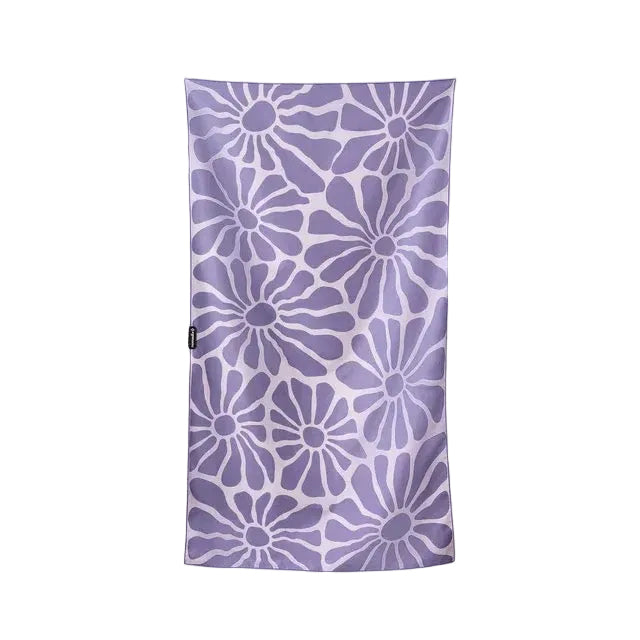 Front view of Nomadix Ultralight Towel in Lazy Daisy Dusk featuring a colorful daisy-inspired pattern