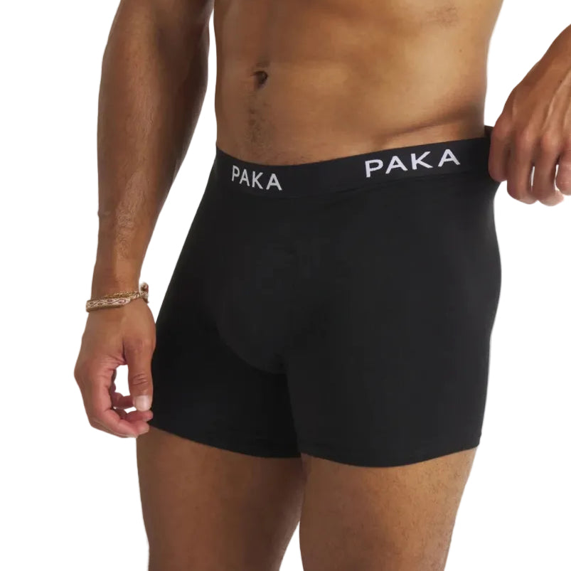 Men's PAKA Essential Boxer Brief in Black shown from the front on model
